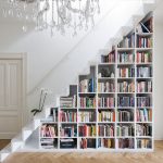 a diy bookcase in a staircase is one of many creative book storage QLFEQJY