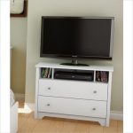 bedroom tv stand small, narrow tv stand flanked by bookcases PYPDBGN