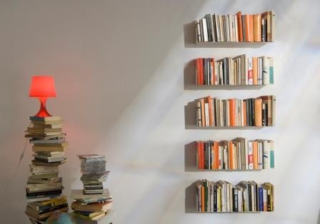 floating bookshelves the bed side even on the kitchen wall! because of the minimal . PGIUYPX