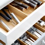 kitchen drawers close-up of open drawers with flatware trays in solid beech. XENCTAM
