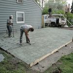 stamped concrete concrete being stamped with an ashlar slate pattern CZLYMRM