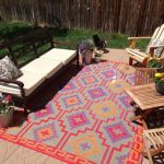 the presence of outdoor patio rugs on the terrace will designate an area YSKDJJC