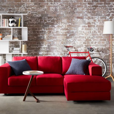 Red Sofa love the brick walls with the comfy red sectional. RGOQQDU