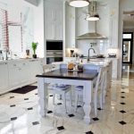 elegant transitional kitchen with black and white marble flooring TGJCSTH