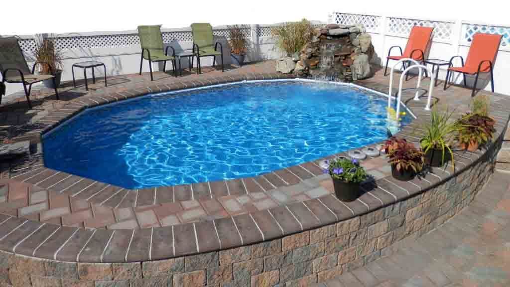 above ground pools that look like in ground aquasport 52 with stones wall and deck IZESHPZ