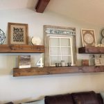 Living Room decor - rustic farmhouse style floating shelves over