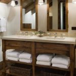 Love love love this rustic vanity in wood, with the white towels .
