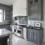 Pair gray cabinets with warm colors and materials. Gray can appear .