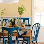 Give mismatched chairs cohesiveness by painting them a matching .