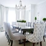 Contemporary Dining Room -- love the patterned chairs for the head .