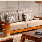 Get a modern look in your living room with modern wooden sofa set .