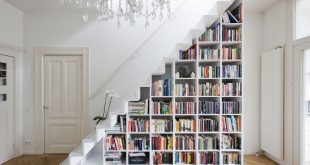 a diy bookcase in a staircase is one of many creative book storage QLFEQJY