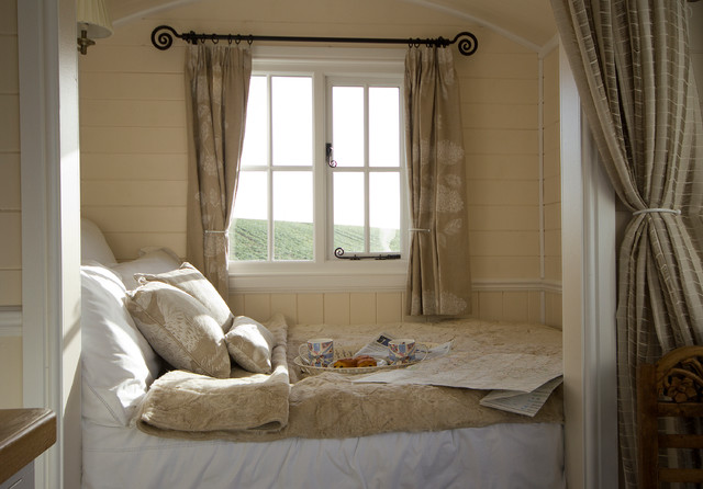 bedroom curtains small farmhouse bedroom idea in other with beige walls TXCVRIY