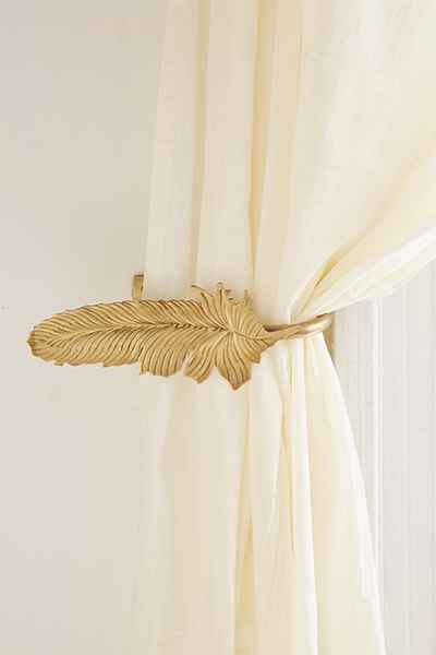 curtain tie backs 23 subtle ways to cover your home in harry potter - quill feather EGYIFEY