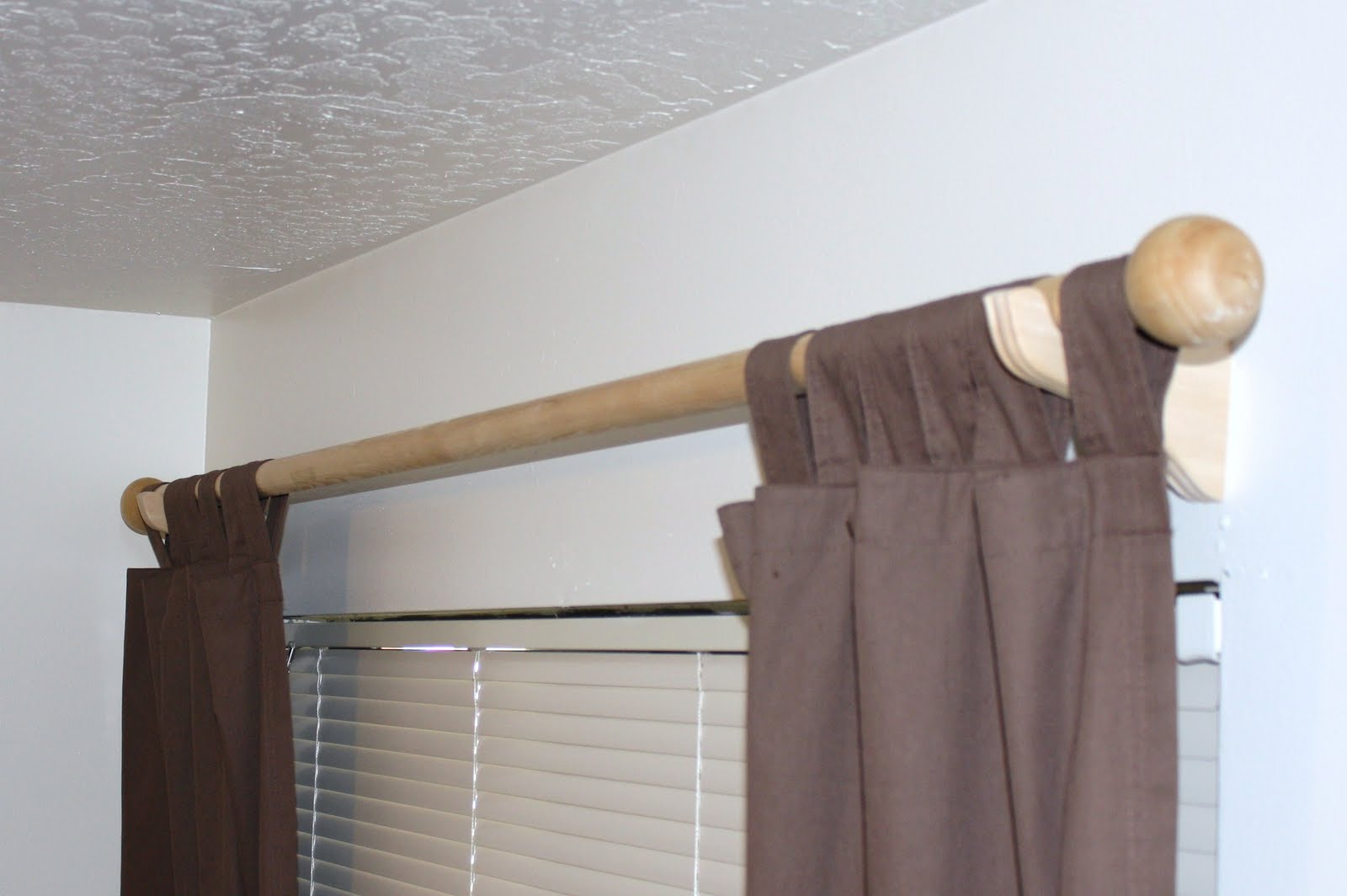 fabulous wooden curtain rods designed without painting mixed with brown  drapes and PKOPOZL