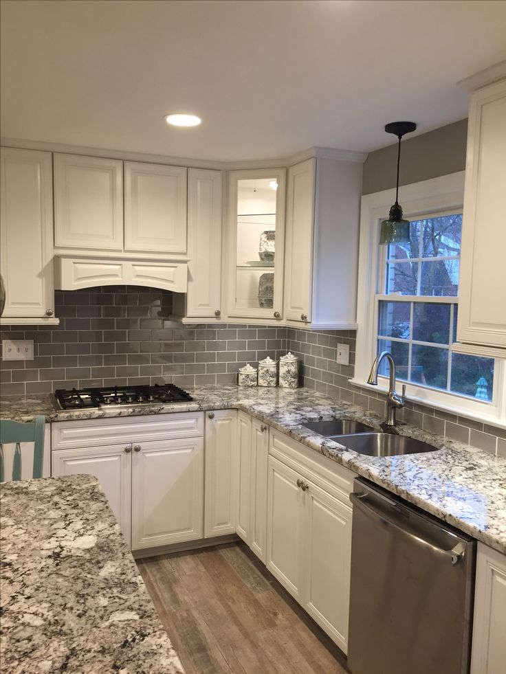 kitchen tile ideas stunning remodeled kitchen using ice gray glass subway tile backsplash.  https://www WKPIWQE