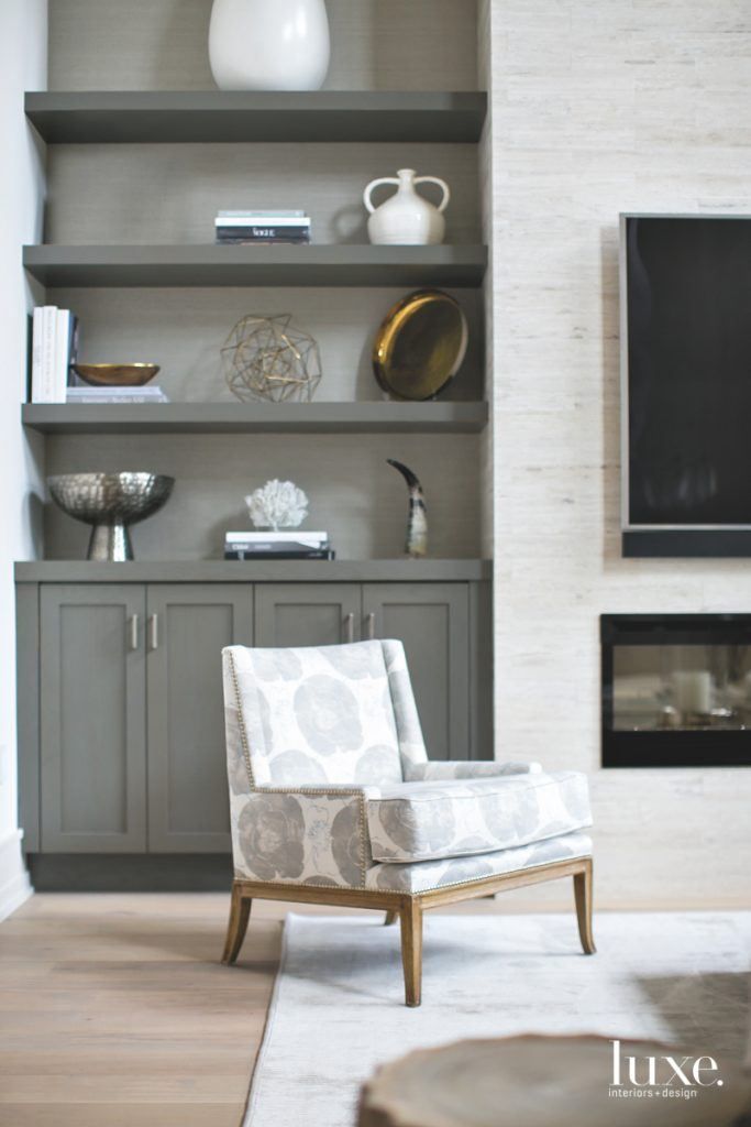 living room cabinets gray cabinets, television, and a comfy chair make the perfect living room XEPBBRJ