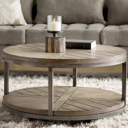 round coffee table featuring a round silhouette, caster base and contrasting wood and iron  design, JYZTLUR