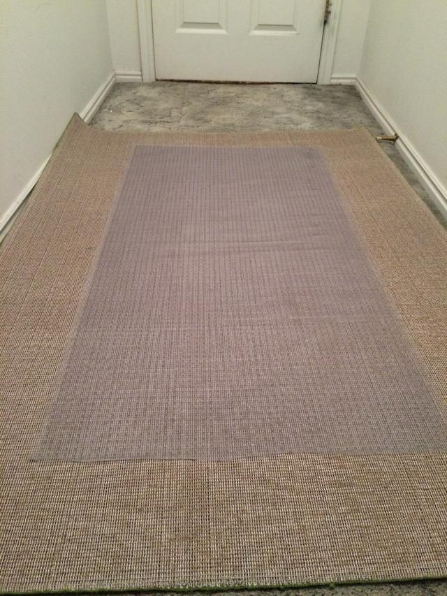 carpet runner on carpet next, place the vinyl runner upside down and center it on the area XEIARSQ