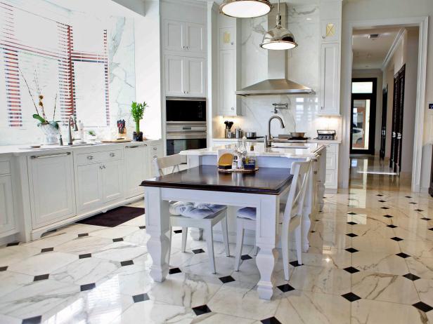 elegant transitional kitchen with black and white marble flooring TGJCSTH