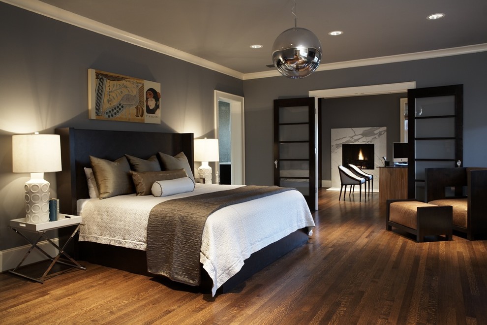 hardwood floors in bedroom home decorating example of a trendy master bedroom design in seattle with gray walls dark FGWXHBW