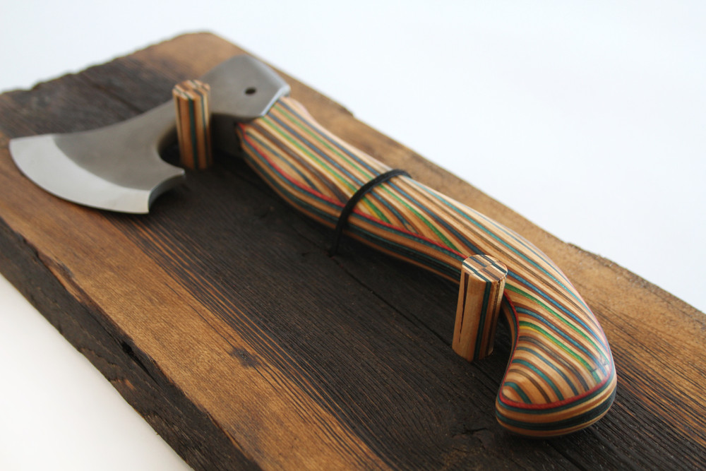 laminating wood an ax with a wooden handle. the handle appears to be composed of QHQVPEQ