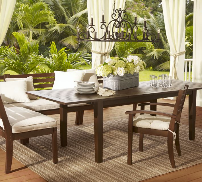 outdoor rug under patio table at $700 for the table alone, without the rug, chairs, cushions, chandelier KOYUTTS