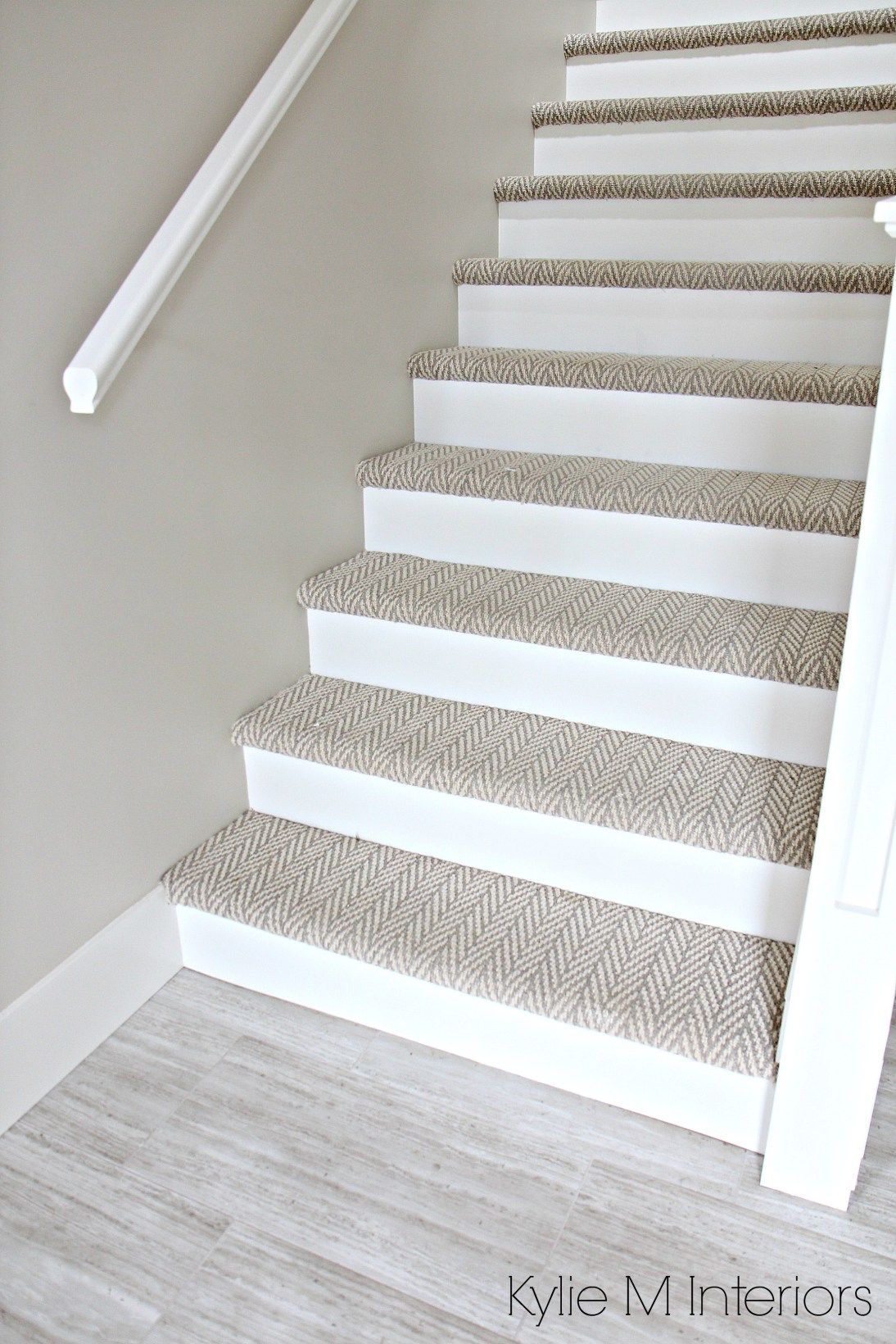 stair carpet stairs with carpet herringbone treads and painted white risers, looks like  a XCLZWKV