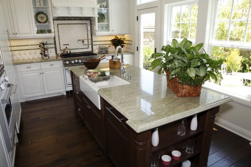 kitchens with white cabinets and dark floors this kitchen has plenty of windows for the natural light LKUBCSF