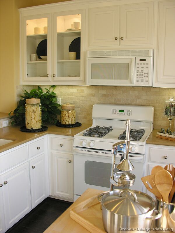 traditional white kitchen cabinets with white appliances XGEBMZP