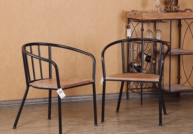 American minimalist loft vintage wrought iron chairs wood restaurant