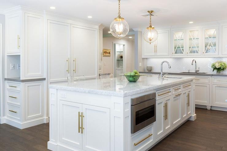 White Kitchen Island with Long Brass Pulls - Transitional - Kitch