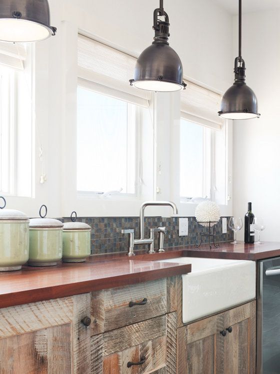 Seamless blend of old (reclaimed wood, farmhouse sink) and new .