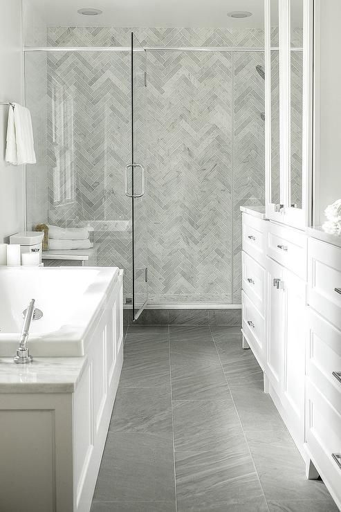 Porcelain bathroom floor in gray, possible alternative to marble .