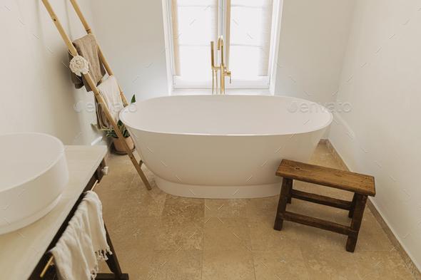 Opt for a freestanding ⁢tub to elevate relaxation‌ in your boho ‍bathroom sanctuary