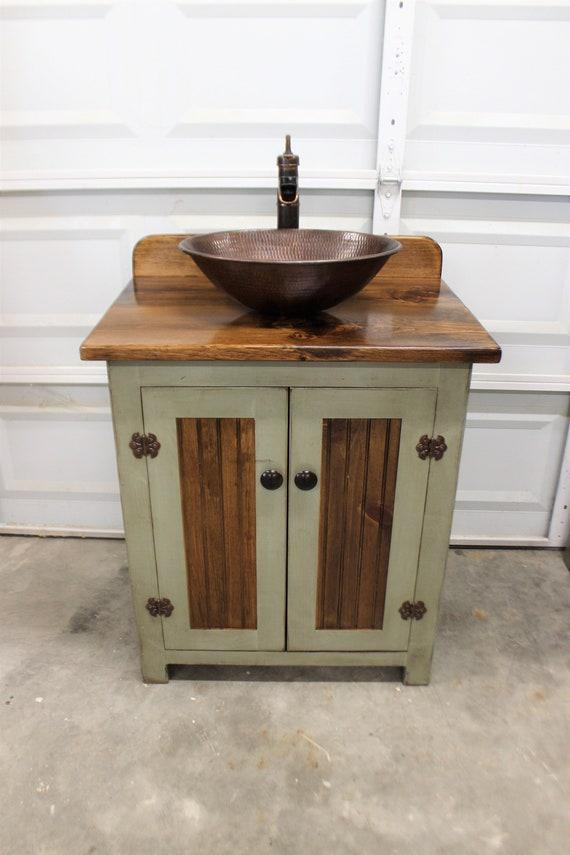 Consider a ⁢wooden bathroom vanity with‍ unique grain patterns