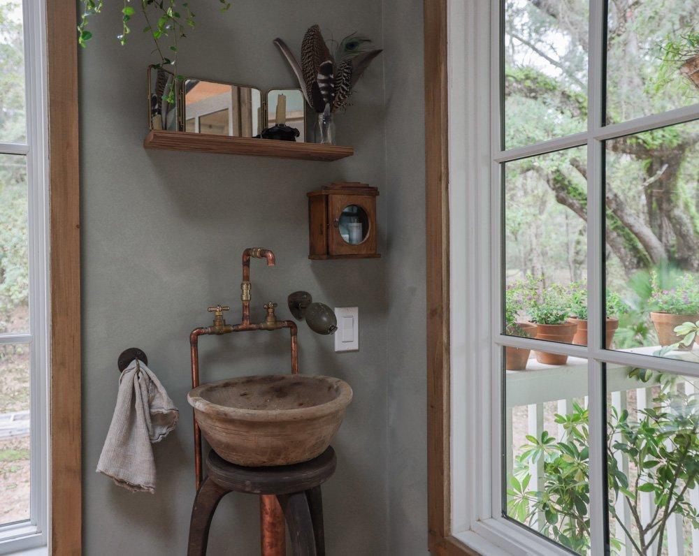 Make a statement with a unique wooden sink design in your bathroom