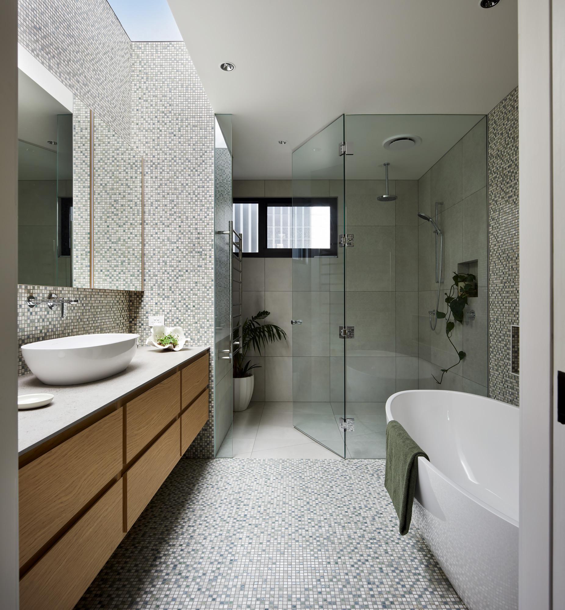 Utilize playful​ tiles​ in unexpected patterns for an eye-catching eclectic bathroom floor