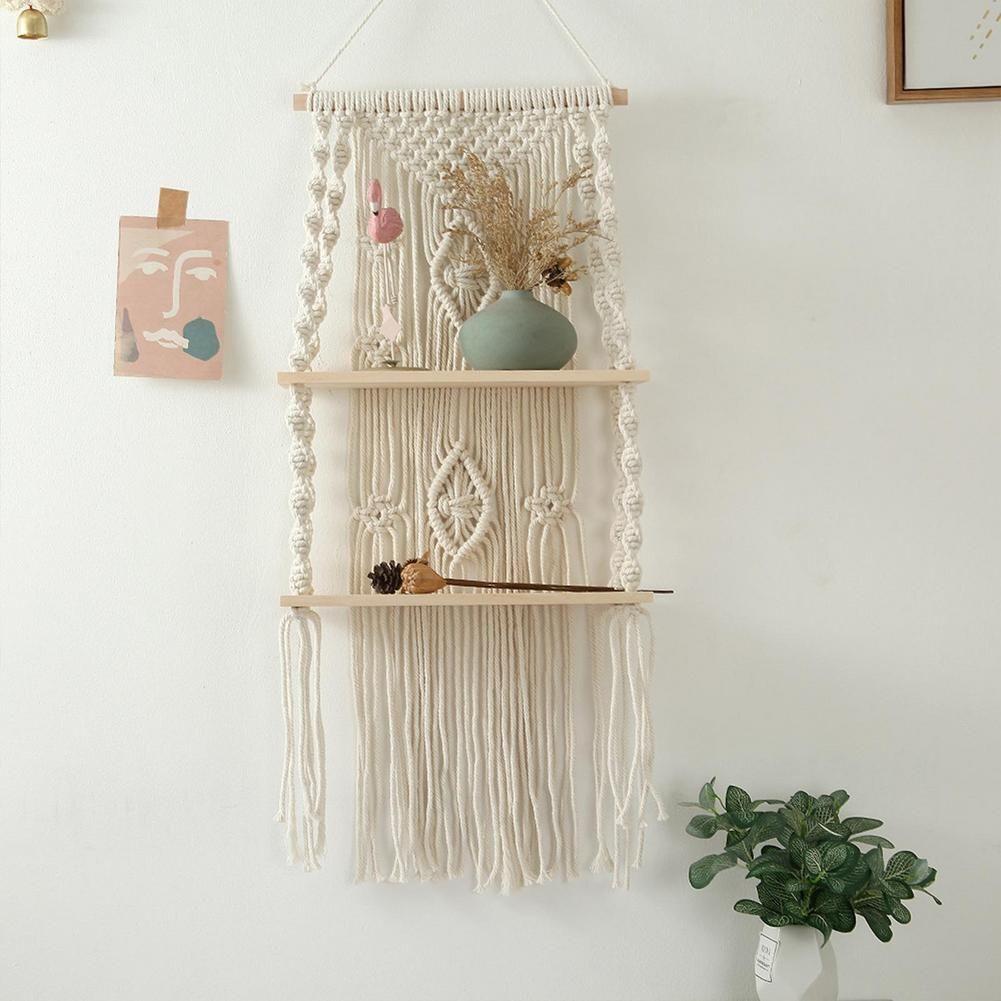 Hang wooden shelves adorned with ⁢soothing candles and décor