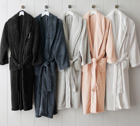 Incorporate soft textures with wooden-themed towels and bathrobes